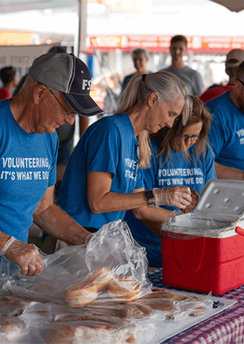 FSB employees servinv food at the Linn County Fair