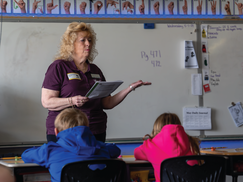 Marcia Baumann participating in Teach Children to Save in Eastern Iowa.