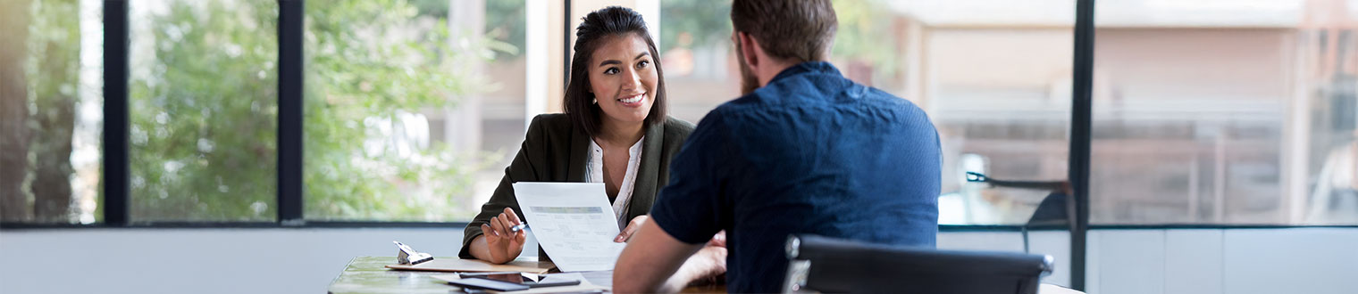 Manager interviewing a potential candidate, showcasing careers in banking opportunities in Eastern Iowa.