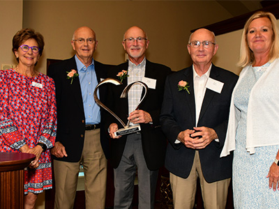 The neighbor family accepting the 2024 St. Luke's Founders Award in Cedar Rapids, Iowa