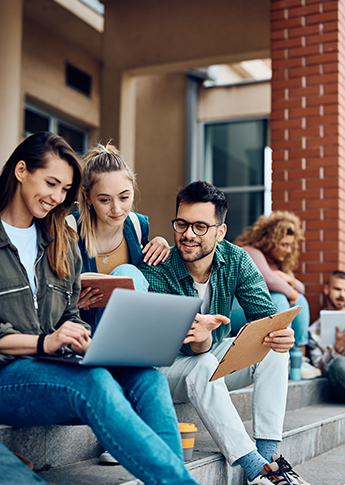 Students in Eastern Iowa looking at all of the benefits FSB's Student Checking offers.