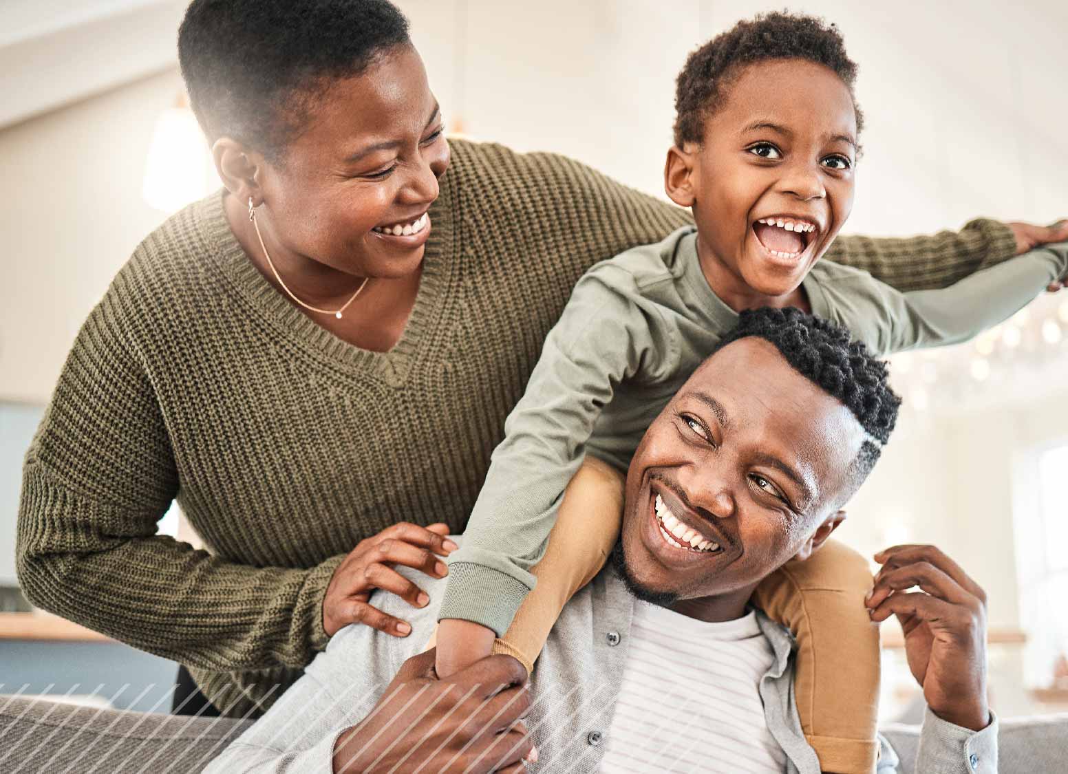 Family celebrating their first home after qualifying for a grant with FSB.