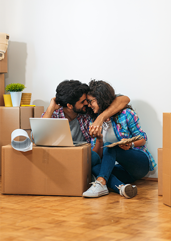 Couple who recently purchased a home with FSB's mortgage team help and is busy moving in.