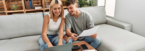 Young couple exploring FHA loans for a home purchase in Cedar Rapids, IA.