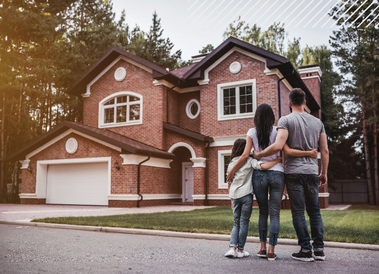 Family enjoying their new home after getting a mortgage loan with FSB.