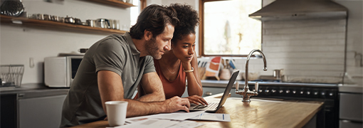 Couple applying for a mortgage loan with FSB online in Cedar Rapids, IA.