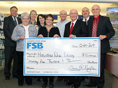 FSB giving a big check to the Hiawatha Public Library for $75,000 in 2017