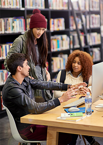 Group of students look at FSB's Student Loans online.