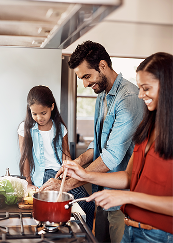 Family enjoying new kitchen after getting a HELOC with FSB in Eastern Iowa.